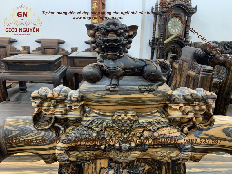 Bộ bàn ghế Nghê Bảo Đỉnh tay 12 gỗ mun hoa