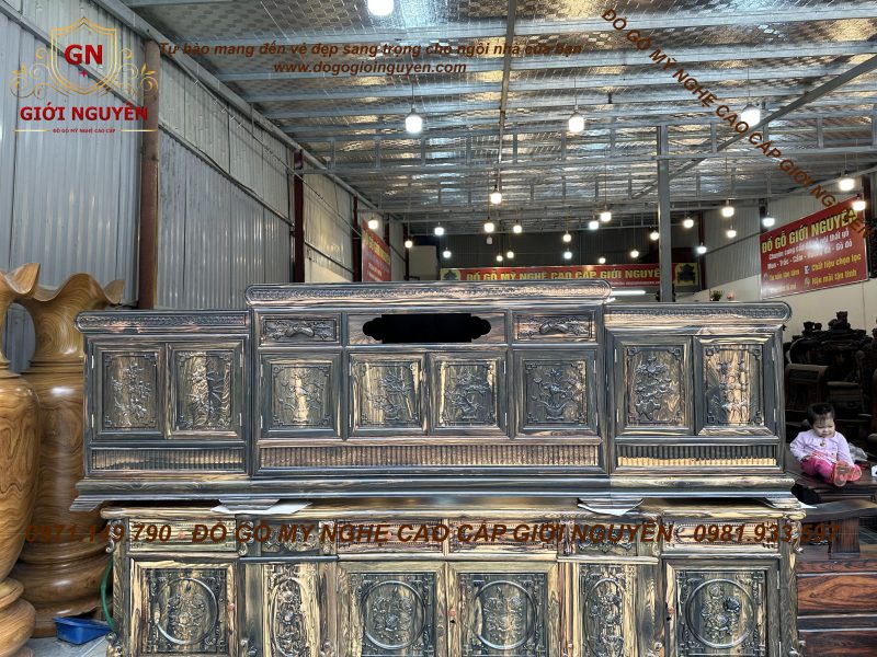 Kệ tivi mõ đồng tiền gỗ mun hoa 2m6